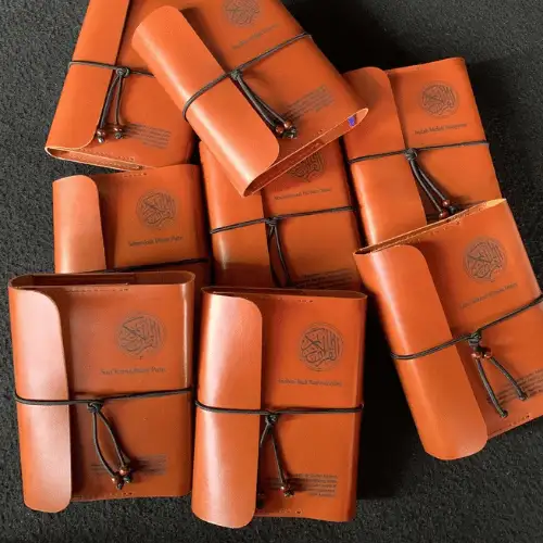 Mushaf with genuine leather cover, customizable with engraved name, calligraphy, or embossing, handmade.